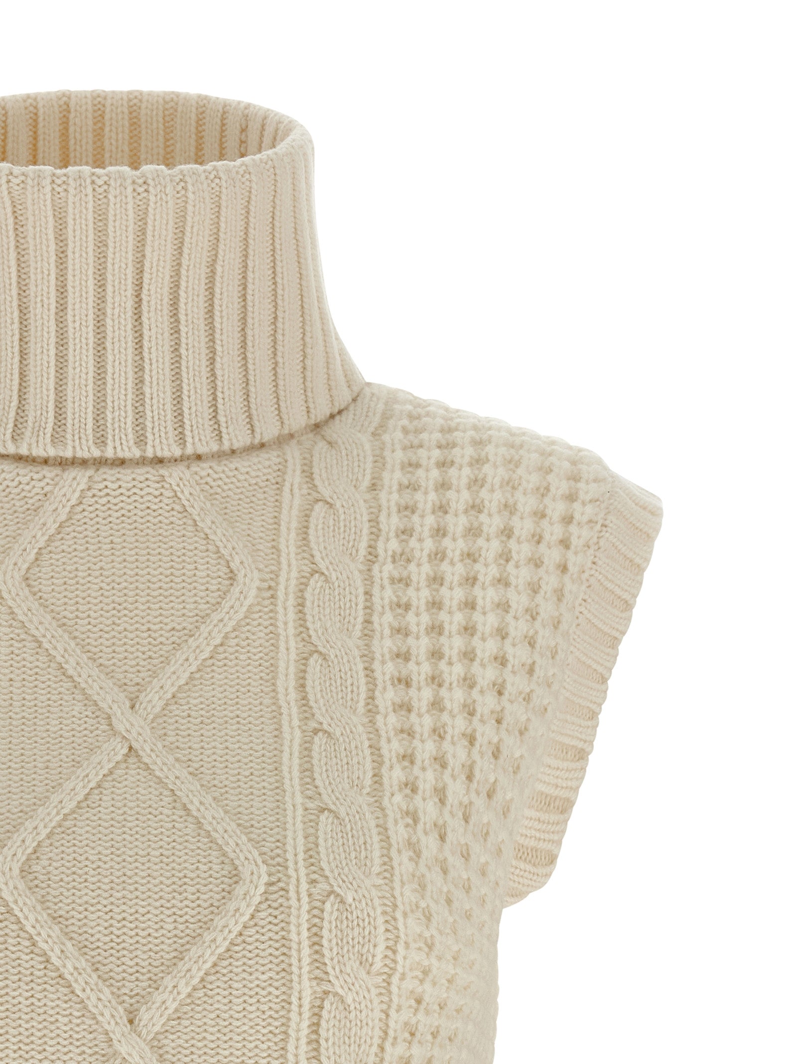 Hooded Vest by PERFECT MOMENT for women in merino wool white showcases a utilitarian silhouette, artfully incorporating hooded and a utilitarian hooded high-neck neckline for a truly utilitarian finish.
