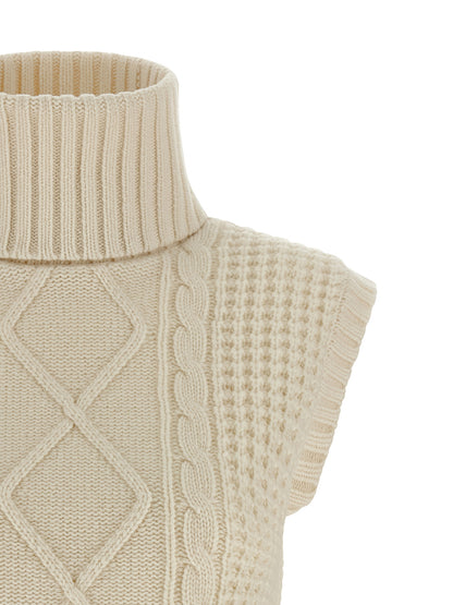 Hooded Vest by PERFECT MOMENT for women in merino wool white showcases a utilitarian silhouette, artfully incorporating hooded and a utilitarian hooded high-neck neckline for a truly utilitarian finish.
