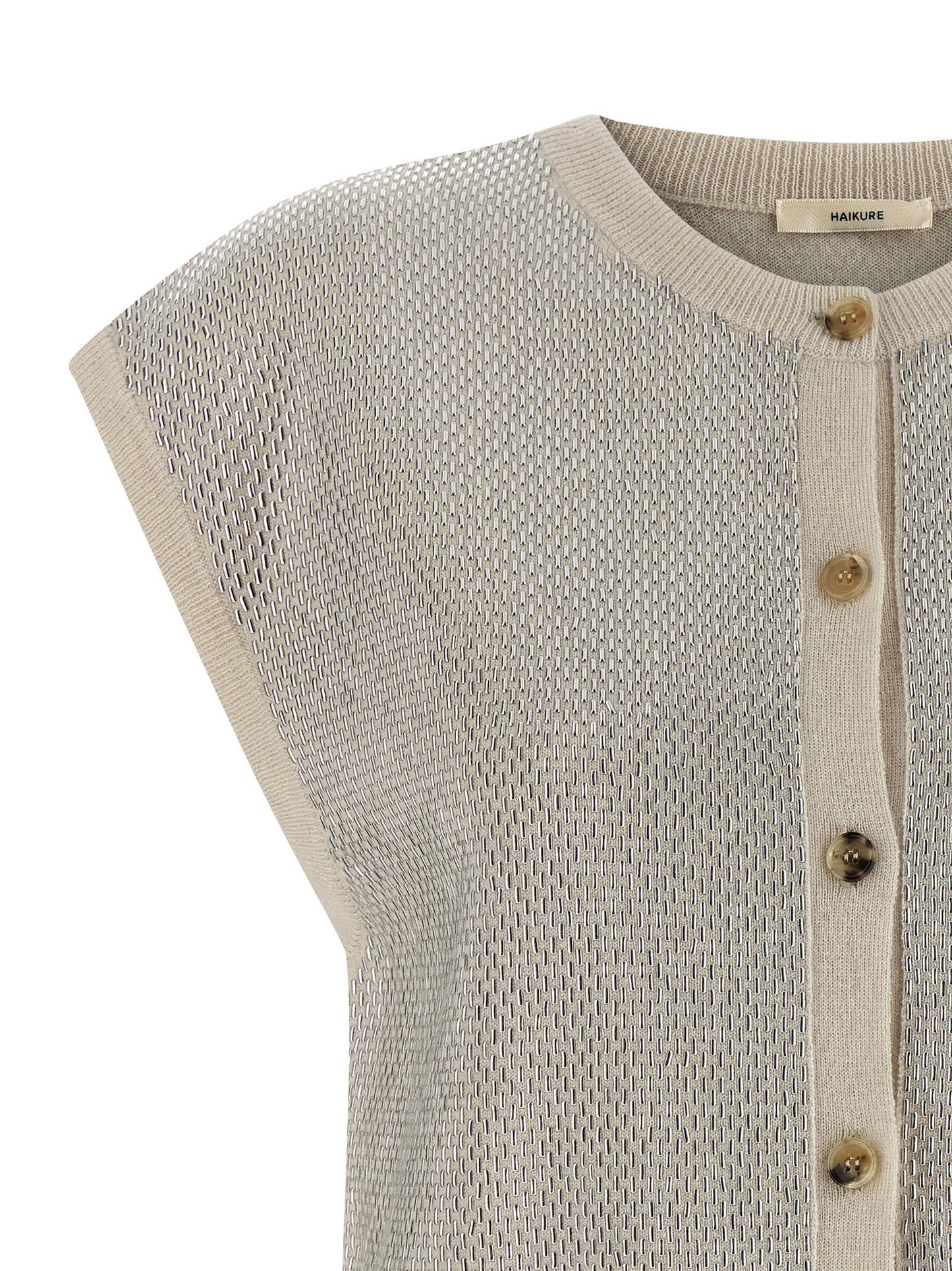 Vest by Haikure for women in virgin wool beige showcases a dynamic silhouette, perfectly balancing with a dynamic for a sophisticated, high-fashion look.