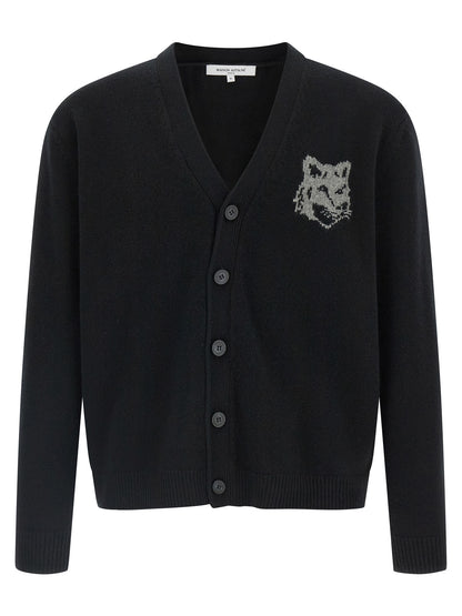 Cardigan by Maison Kitsuné for men in merino wool black showcases a captivating silhouette, artfully detailed with a captivating and v-neck neckline for a truly sophisticated captivating look.