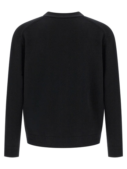 Cardigan by Maison Kitsuné for men in merino wool black features an crisp silhouette, showcasing a sophisticated v-neck neckline and detail for a truly crisp finish.