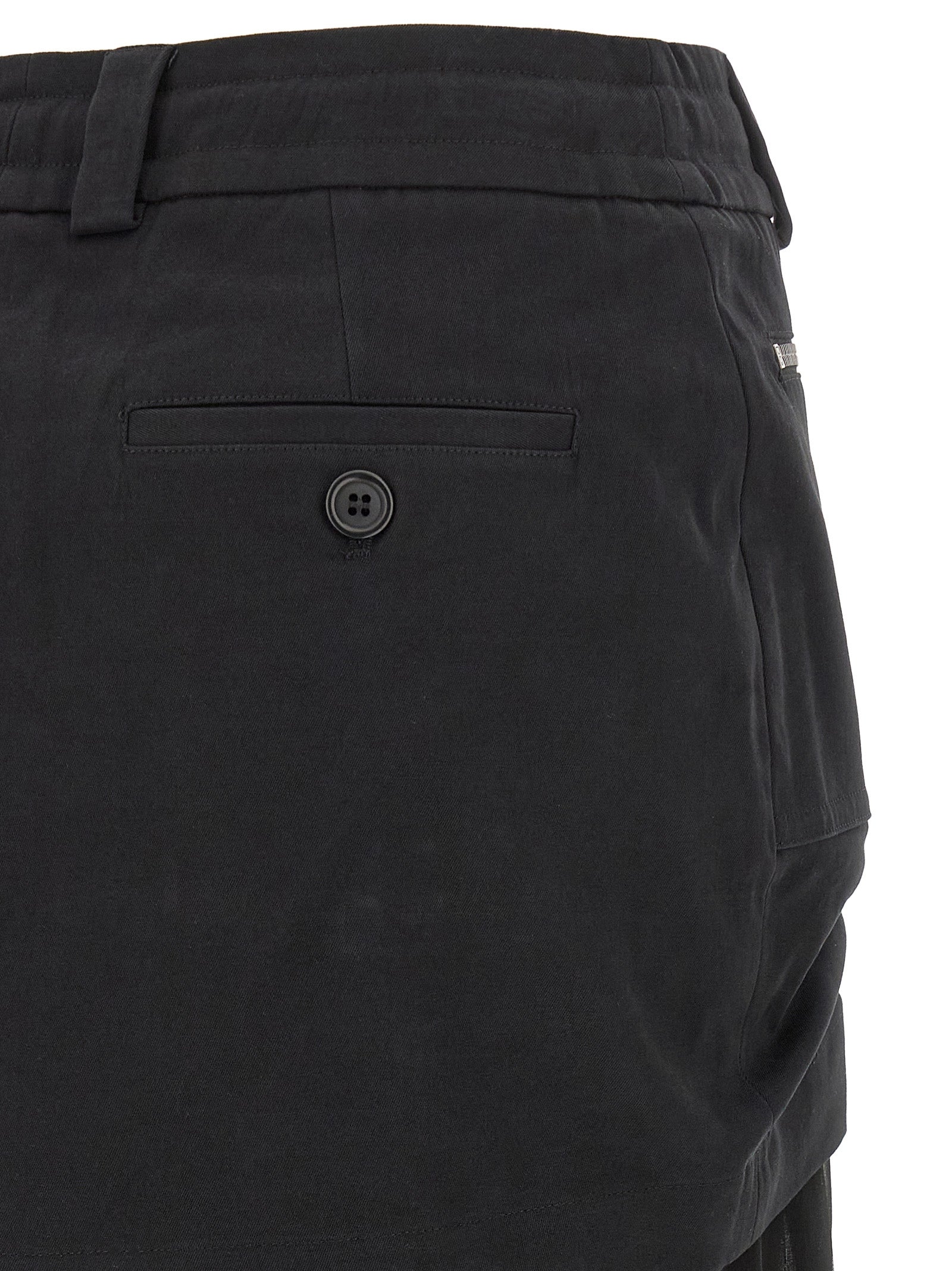 Skirt by Dolce & Gabbana for women in cotton chiffon twill black features a contoured silhouette from the Women's Pleated Cotton Chiffon Twill Midi Skirt collection, characterized by its contoured midi for a contoured finish.