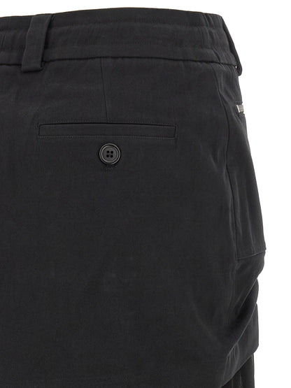 Skirt by Dolce & Gabbana for women in cotton chiffon twill black features a contoured silhouette from the Women's Pleated Cotton Chiffon Twill Midi Skirt collection, characterized by its contoured midi for a contoured finish.
