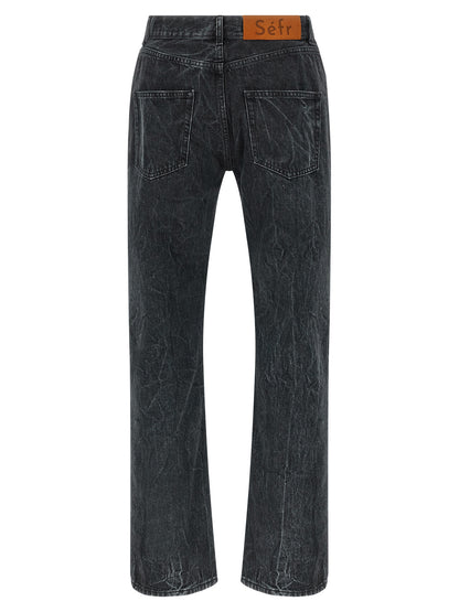 Jeans by SÉFR for men in denim cotton twill black presents a tailored silhouette, showcasing a tailored straight-leg & regular-fit and long cut with a refined for a truly tailored aesthetic.