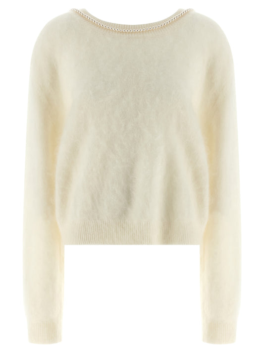 Cardigan by BERNADETTE for women in cashmere pearl & white features a nuanced silhouette with a refined round neckline and nuanced long-sleeve detailing for a sophisticated look.