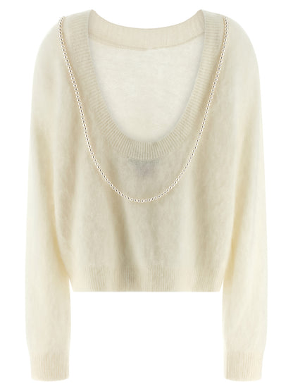 Cardigan by BERNADETTE for women in cashmere pearl & white showcases a luxurious silhouette, meticulously detailed with a sophisticated round neckline and for a refined finish.