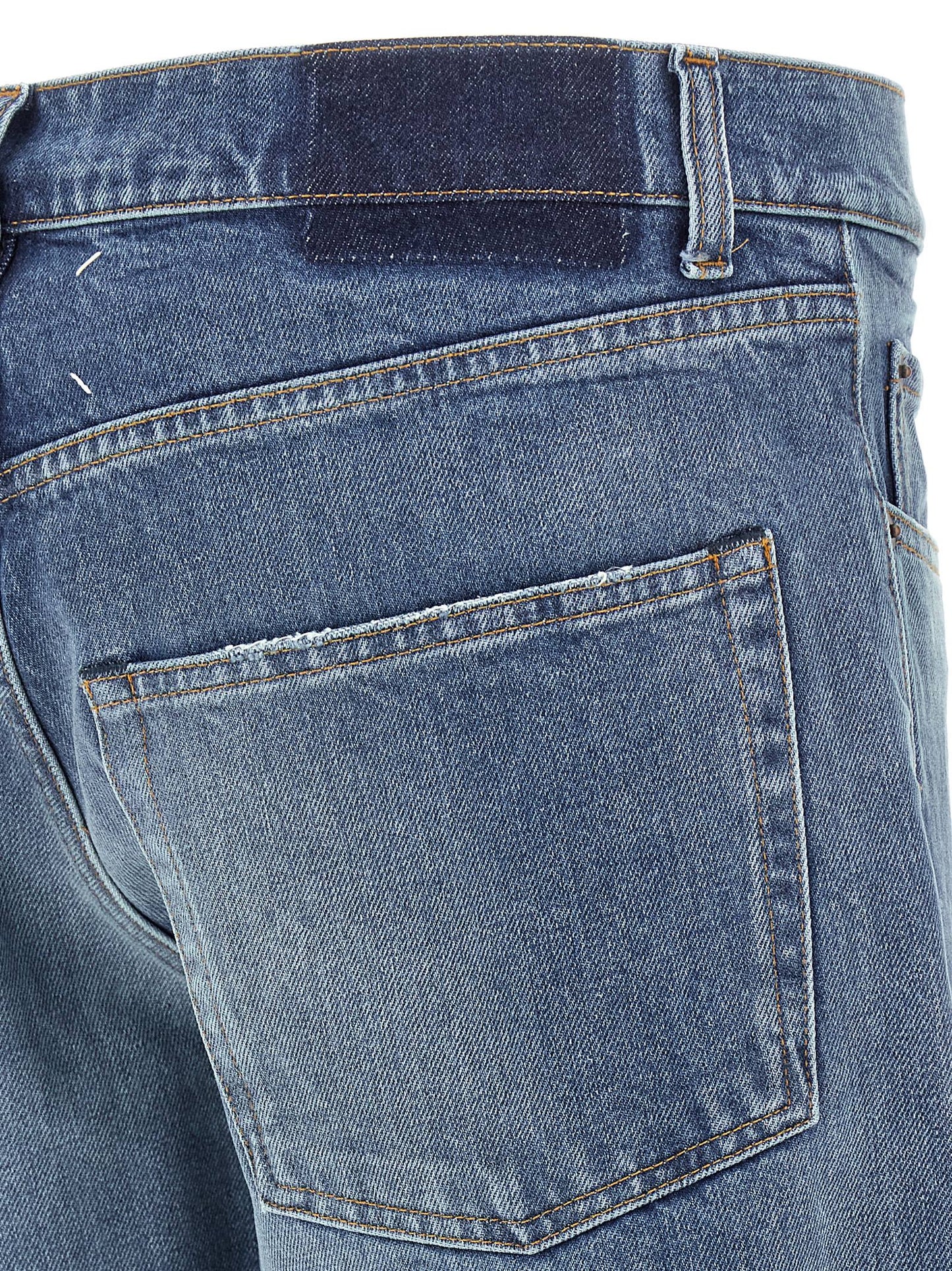 Jeans by Maison Margiela for men in denim cotton blue presents a refined pantology silhouette, artfully defined by a refined pantology straight-leg, long, and a sophisticated .