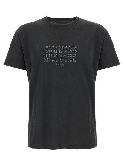 T-Shirt by Maison Margiela for women in cotton black, signature & print showcases a unassuming silhouette, artfully detailed with a refined crew neckline and unassuming short-sleeve for a sophisticated, contemporary look.