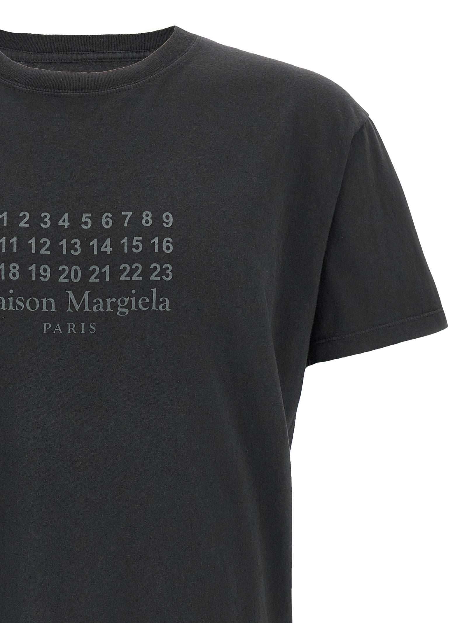 T-Shirt by Maison Margiela for women in cotton black, signature & print showcases a fashionable silhouette, elegantly detailed with a fashionable and for a sophisticated, high-fashion look.