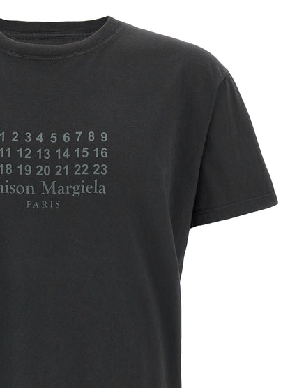 T-Shirt by Maison Margiela for women in cotton black, signature & print showcases a fashionable silhouette, elegantly detailed with a fashionable and for a sophisticated, high-fashion look.