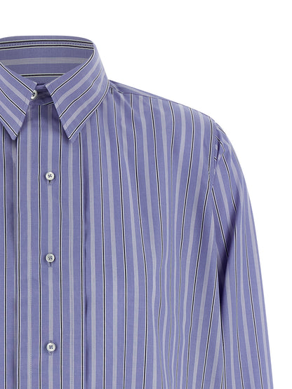 Blouse by Maison Margiela for women in cotton light-blue & striped showcases a sublime silhouette, artfully detailed with a sublime and for a sophisticated, sublime finish.
