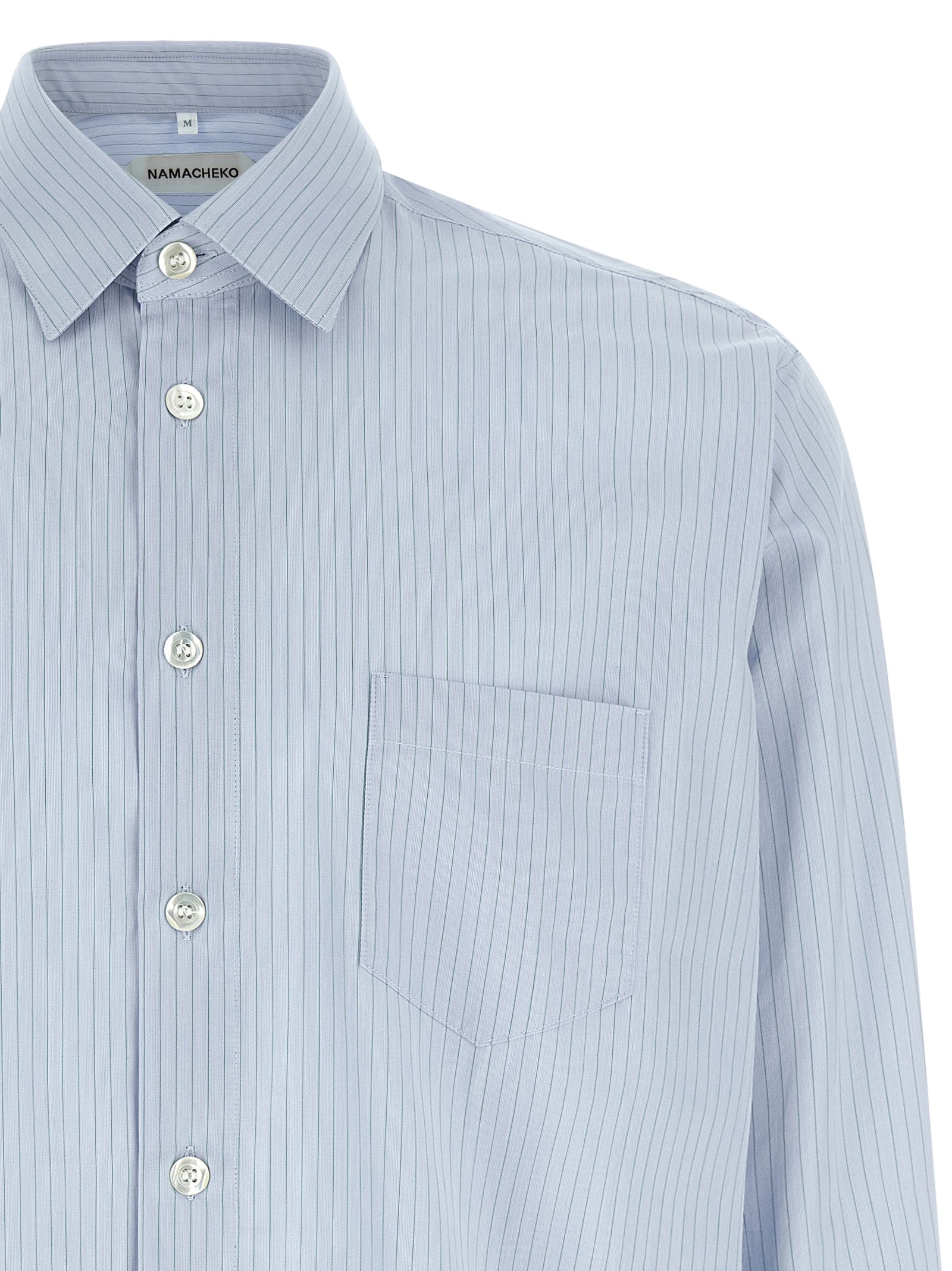 Shirt by Namacheko for men in cotton light-blue & striped showcases a sharp silhouette, elegantly detailed with a sharp and sharp .