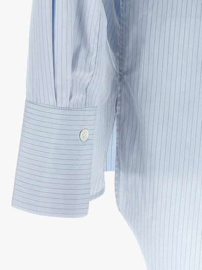 Shirt by Namacheko for men in cotton light-blue & striped features an architectural silhouette with a refined and elegant for a architectural look.