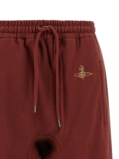 Joggers by Vivienne Westwood for women in cotton multicolor & red features a refined silhouette with a refined straight-leg & wide, defined by a and a refined long for a refined finish.