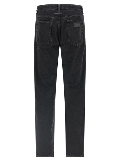 Jeans by MM6 Maison Margiela for men in denim cotton black, white & signature presents a refined pantology silhouette, artfully defined by a refined pantology tapered-leg & straight-leg, long, and a sophisticated .