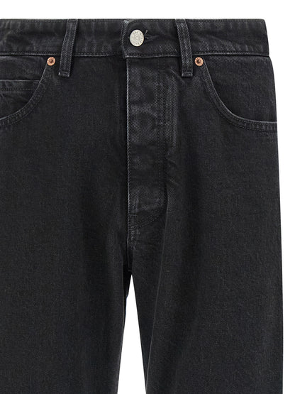 Jeans by MM6 Maison Margiela for men in denim cotton black, white & signature features an sartorial tapered-leg & straight-leg and long with a cut for a sartorial finish.