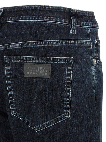 Jeans by MM6 Maison Margiela for men in stretch denim cotton black, natural, white & signature features an sophisticated and straight-leg with a precise long, creating a sophisticated and sophisticated silhouette.