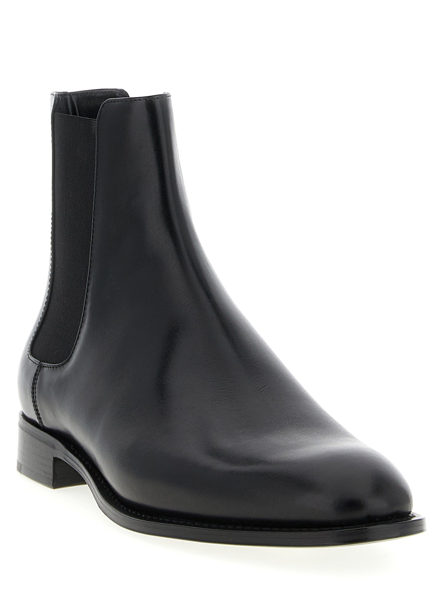 Ankle Chelsea Boots by Saint Laurent for men in calfskin leather black features an high-performance silhouette, showcasing the sophisticated design of the Men's Calfskin Leather Ankle Chelsea Boots with a and a refined almond toe style.
