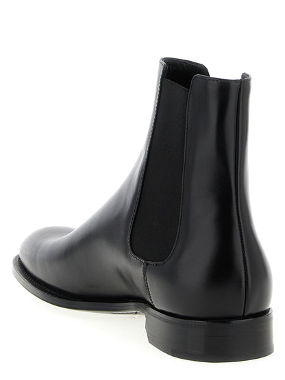 Ankle Chelsea Boots by Saint Laurent for men in calfskin leather black features an dynamic silhouette, showcasing the dynamic Men's Calfskin Leather Ankle Chelsea Boots design with its distinctive and elegant almond toe style.