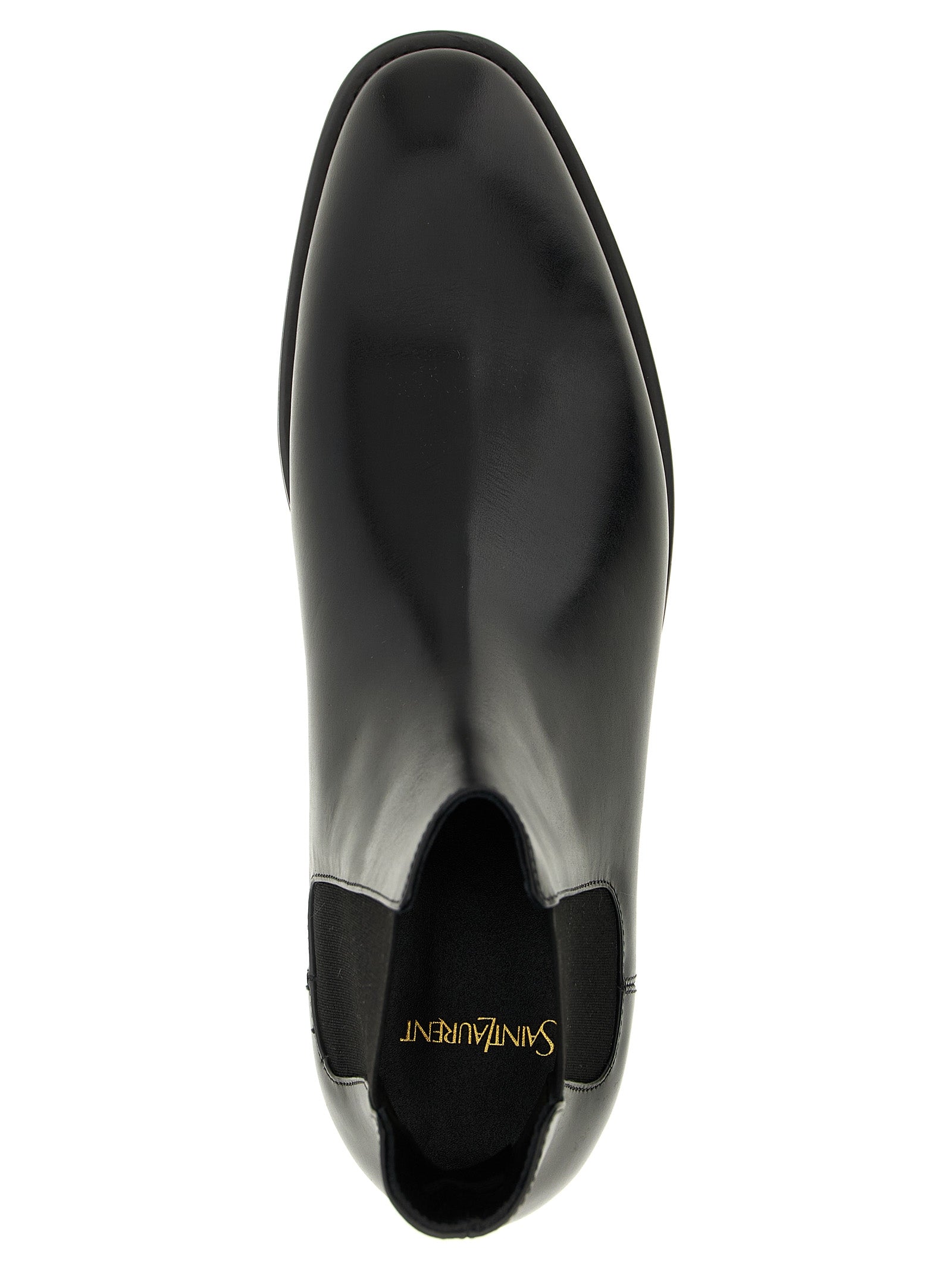 Ankle Chelsea Boots by Saint Laurent for men in calfskin leather black features an avant-garde Men's Calfskin Leather Ankle Chelsea Boots silhouette, defined by a sophisticated and a avant-garde almond toe style.
