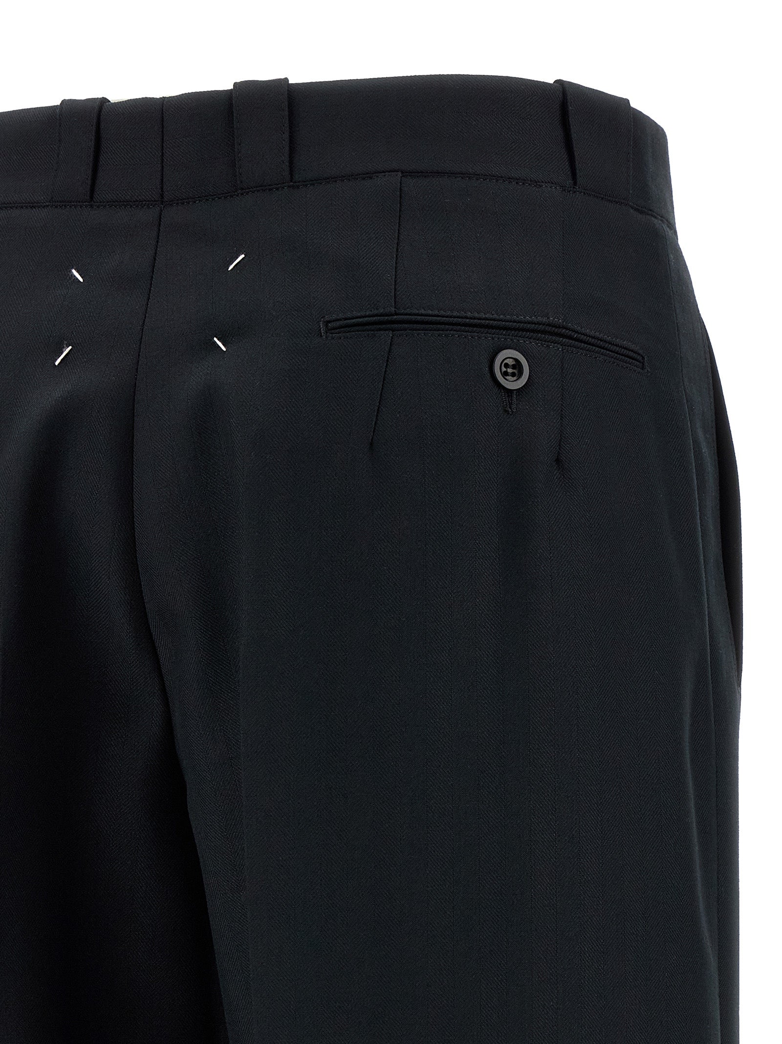 Trousers by Maison Margiela for women in wool & polyester black, herringbone & signature features an on trend silhouette, showcasing a sophisticated straight-leg & wide with a long and for an on trend finish.
