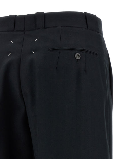 Trousers by Maison Margiela for women in wool & polyester black, herringbone & signature features an on trend silhouette, showcasing a sophisticated straight-leg & wide with a long and for an on trend finish.