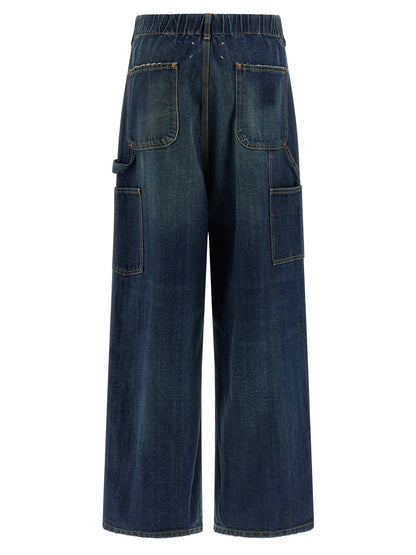 Jeans by Maison Margiela for women in denim cotton blue & signature features an sartorial relaxed-fit & wide and long with a cut for a sartorial finish.