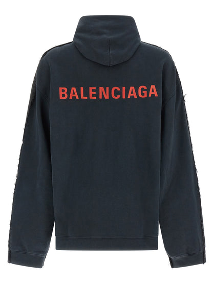Hooded Trucker Jacket by Balenciaga for men in denim cotton black showcases a bohemian silhouette, artfully detailed with a bohemian hooded shirt-collar neckline and signature pockets & hooded for a truly bohemian finish.