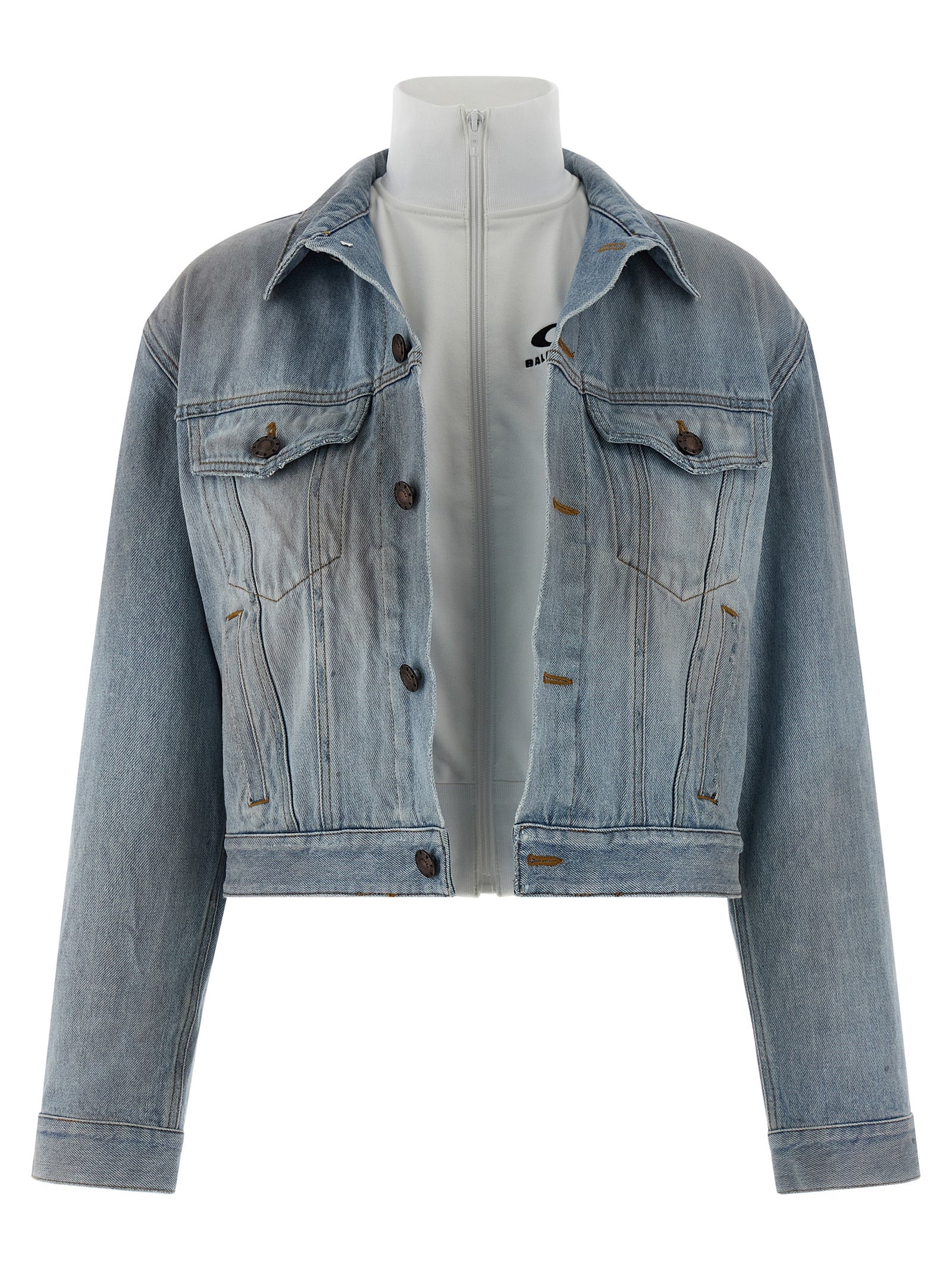 Trucker Jacket by Balenciaga for women in denim cotton light-blue features a dramatic silhouette, showcasing a sophisticated shirt-collar high-neck neckline and distinctive for a dramatic aesthetic.