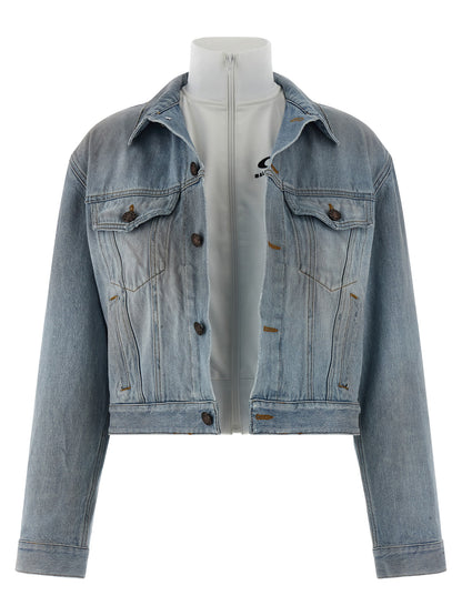 Trucker Jacket by Balenciaga for women in denim cotton light-blue features a dramatic silhouette, showcasing a sophisticated shirt-collar high-neck neckline and distinctive for a dramatic aesthetic.