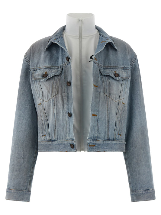 Trucker Jacket by Balenciaga for women in denim cotton light-blue features a dramatic silhouette, showcasing a sophisticated shirt-collar high-neck neckline and distinctive for a dramatic aesthetic.