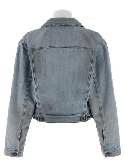 Trucker Jacket by Balenciaga for women in denim cotton light-blue showcases a bohemian silhouette, artfully detailed with a bohemian shirt-collar high-neck neckline and signature for a truly bohemian finish.