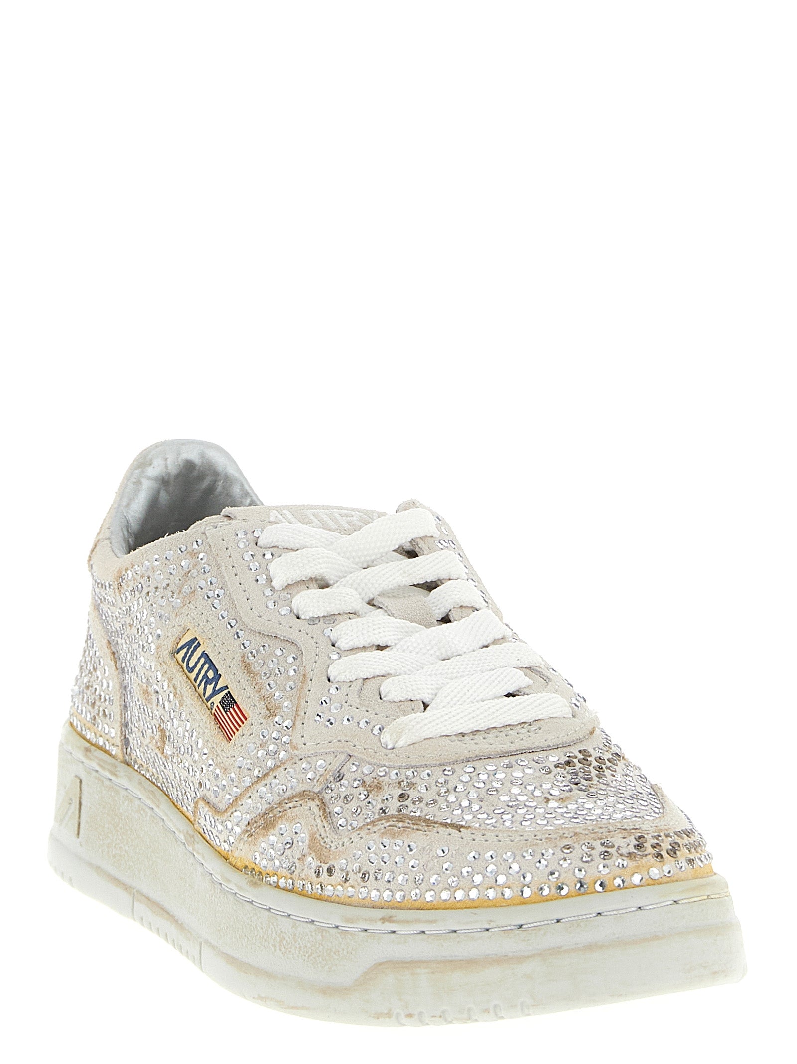 Sneakers by Autry for women in cotton & bos taurus suede cowhide leather beige presents a on trend silhouette from the Women's Chunky Cotton & Bos Taurus Suede Cowhide Leather Sneakers collection, showcasing a on trend chunky style for an elevated aesthetic.