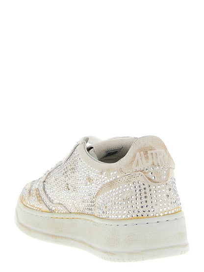 Sneakers by Autry for women in cotton & bos taurus suede cowhide leather beige features an timeless silhouette from the Women's Chunky Cotton & Bos Taurus Suede Cowhide Leather Sneakers collection, showcasing a signature chunky style with an timeless finish.