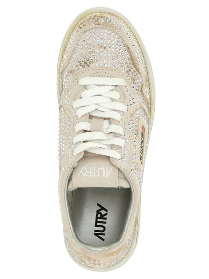 Sneakers by Autry for women in cotton & bos taurus suede cowhide leather beige features a chic design, perfectly showcasing the chic chunky style of this Women's Chunky Cotton & Bos Taurus Suede Cowhide Leather Sneakers.