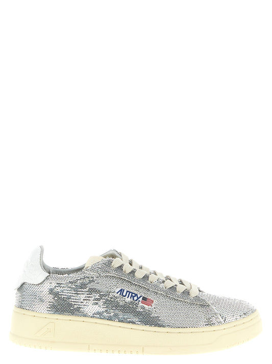 Sneakers by Autry for women in polyester cotton terrycloth & crocodile skin leather silver & print presents a sumptuous silhouette, artfully capturing the essence of the Women's Low Top Polyester Cotton Terrycloth & Crocodile Skin Leather Sneakers with its sumptuous low-top style design.