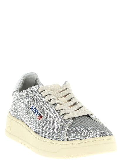 Sneakers by Autry for women in polyester cotton terrycloth & crocodile skin leather silver & print features an fashionable silhouette, showcasing the premium Women's Low Top Polyester Cotton Terrycloth & Crocodile Skin Leather Sneakers in a fashionable low-top style that offers a fashionable finish for refined style.