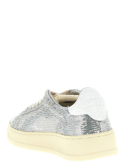 Sneakers by Autry for women in polyester cotton terrycloth & crocodile skin leather silver & print features an versatile design from the Women's Low Top Polyester Cotton Terrycloth & Crocodile Skin Leather Sneakers collection, highlighting a versatile low-top style for a premium, high-fashion look.