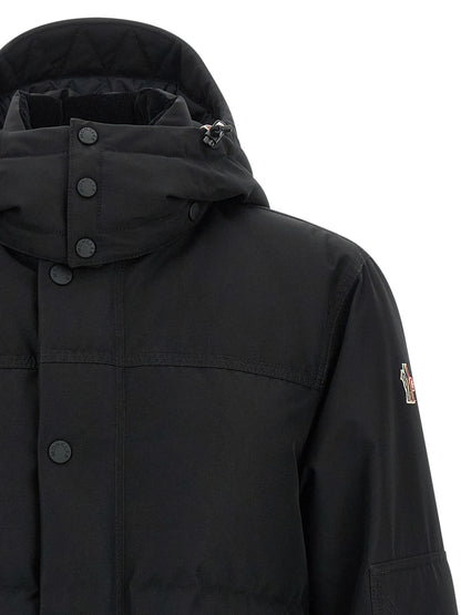 Hooded Windbreaker Jacket by Moncler Grenoble for men in polyester corduroy & goose-down black showcases a modern silhouette, integrating hooded, insulated & windproof and a modern hooded high-neck neckline for a sophisticated finish.
