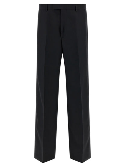 Trousers by Gucci for men in polyester black features a tailored silhouette with a tailored straight-leg, defined by its long and a sophisticated .