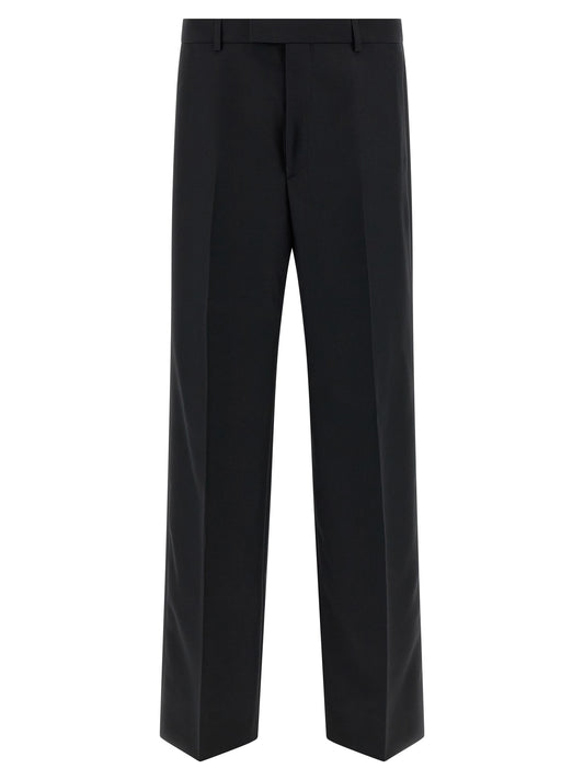 Trousers by Gucci for men in polyester black features a tailored silhouette with a tailored straight-leg, defined by its long and a sophisticated .