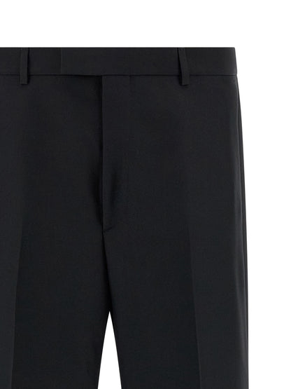 Trousers by Gucci for men in polyester black features an sartorial silhouette, showcasing a precise straight-leg and long with a sartorial for a refined look.