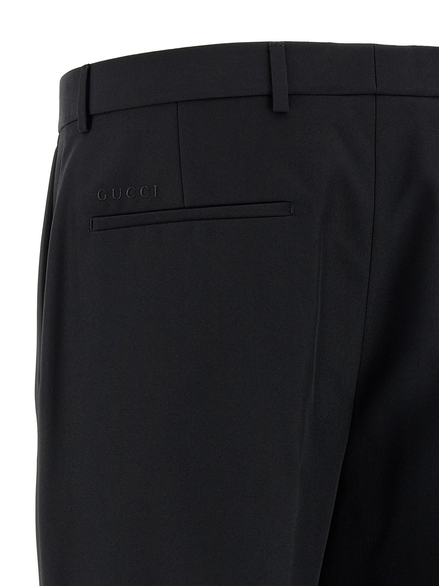 Trousers by Gucci for men in polyester black features a artisanal silhouette, showcasing a sophisticated straight-leg with a long and for a artisanal finish.