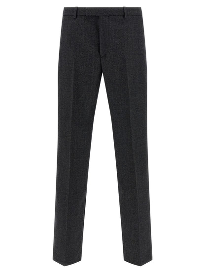 Trousers by Gucci for men in wool gray features a tailored silhouette with a tailored straight-leg, defined by its long and a sophisticated .