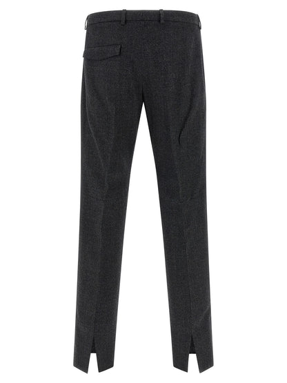 Trousers by Gucci for men in wool gray presents a perennial silhouette, meticulously tailored with a straight-leg cut, long finish, and an elegant .