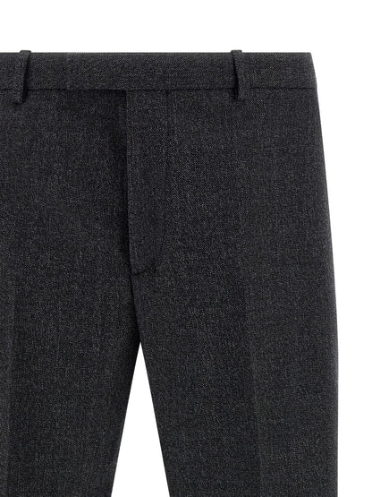 Trousers by Gucci for men in wool gray features an sartorial silhouette, showcasing a precise straight-leg and long with a sartorial for a refined look.