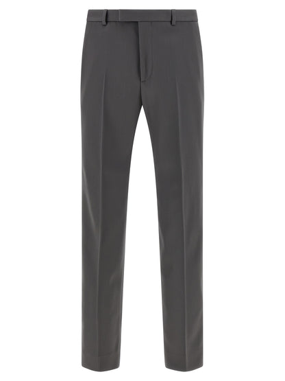 Trousers by Gucci for men in satin wool gray presents a smart silhouette, meticulously detailed with a smart straight-leg, a smart long, and a smart .