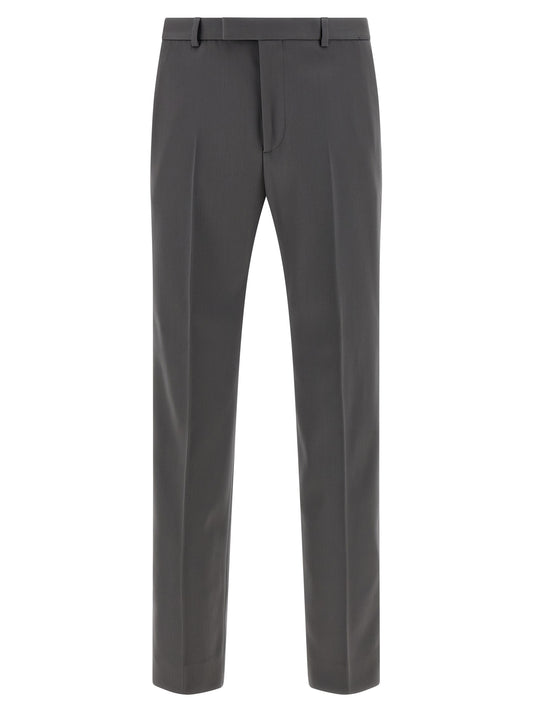 Trousers by Gucci for men in satin wool gray presents a smart silhouette, meticulously detailed with a smart straight-leg, a smart long, and a smart .