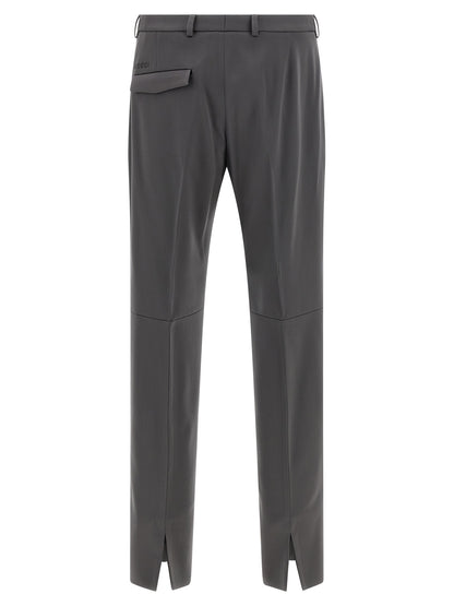 Trousers by Gucci for men in satin wool gray presents a perennial silhouette, meticulously tailored with a straight-leg cut, long finish, and an elegant .