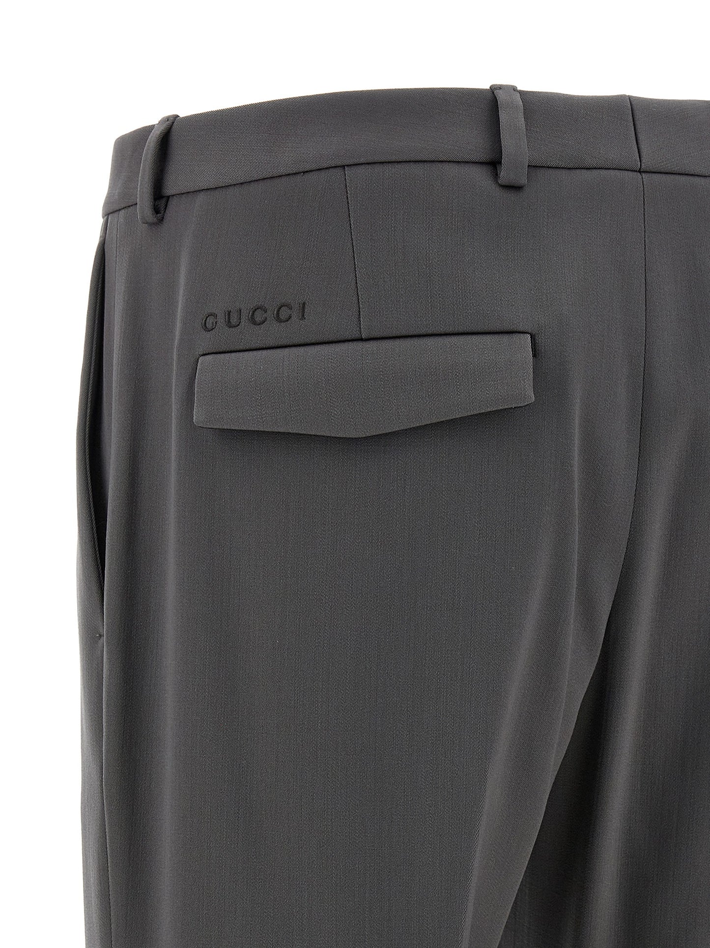 Trousers by Gucci for men in satin wool gray features a artisanal silhouette, showcasing a sophisticated straight-leg with a long and for a artisanal finish.